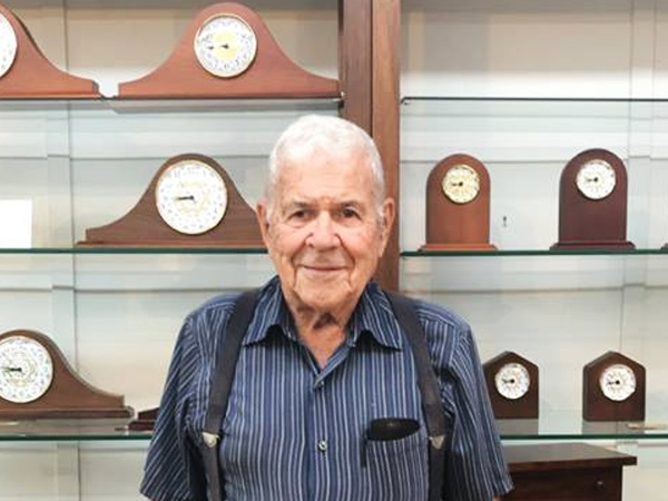 Edward Clore with clocks of his creation