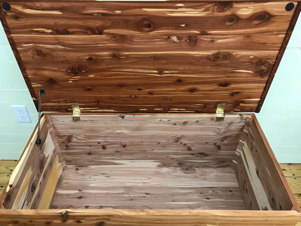 Cedar wood blanket chest with top open